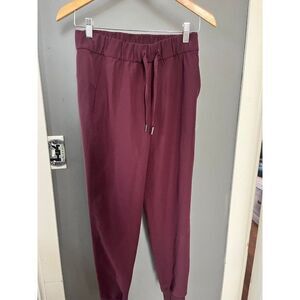 Lululemon size 4 on the fly jogger pant dark purple adobe burgundy